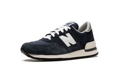 The New Balance 990v1 “Navy/White” is a colorway of the original version of the lifestyle shoe with a navy-based appearance.  From New Balance’s heralded “Made in USA” line headed up by Aimé Leon Dore founder and lead designer Teddy Santis, the 990v1 is a classic sneaker beloved for its timeless design and comfort.  The shoe has a navy mesh upper with navy suede overlays.  A white leather “N” appears on the sides.  “New Balance” branding is seen on the heel tab and an “NB” logo is found on the tongue.  A cream-colored rubber heel counter ensures a supportive fit. New Balance 2002r Navy Cream, New Balance Navy Round Toe Sneakers, Sporty Navy Non-slip Sneakers, New Balance White And Navy, New Balance 992 White Navy, Nb Logo, Teddy Santis, Balance Branding, New Balance 990