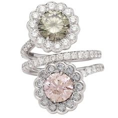 The 18k white gold flower bypass ring features a GIA 1.93-carat fancy dark greenish-gray round brilliant-cut diamond and a GIA 1.70-carat fancy brown-pink round brilliant-cut diamond. Each stone is surrounded by blue-gray and near colorless round brilliant-cut diamonds, weighing in total 2.69 carats. The ring is a size 6 1/4, and weighs 7.71 grams. Accompanied by GIA reports #1132613962 and #5121274309. A unique and beautiful statement ring. Pink Sapphire Jewelry, Pink Diamond Jewelry, Jewellery Rings, Vintage Style Rings, Bypass Ring, Jewelry Rings Diamond, Green Diamond, Diamond Gold, Gold Flower