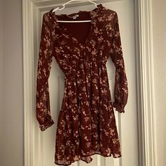 Never Worn!!! Red Dress With Long Sleeves, Ties In The Front. In Perfect Condition! Casual Burgundy V-neck Mini Dress, Casual Burgundy Mini Dress For Spring, Casual Burgundy Dress For Date Night, Red Dress With Long Sleeves, Eagle Dress, American Eagle Dress, Dress With Long Sleeves, Red Dress, American Eagle Outfitters