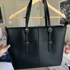 Never Used Black Faux Leather Computer Bag. Multiple Inside Compartments Including A Padded Computer Sleeve Compatible For 13" - 15.6" Laptops. Includes Longer Strap For Crossbody Wear. Dimensions: L=15.3" X H=12.6" X D=5.1" Handles Dimensions: Adjustable: H=9.1"-12.2" Crossbody Strap Dimensions: H=24.4"- 51.9" Color: Black With Silver Accents Material: Pu Leather Advertised As Being Water-Repellent And Scratch-Resistant Condition: Never Used; No Damage Professional Work Bag That Is Lightweight, Black Faux Leather Bag With Silver-tone Hardware, Daily Use Faux Leather Bags With Silver-tone Hardware, Rectangular Amazon Bag For Everyday Use, Amazon Rectangular Bag For Everyday Use, Black Bags With Silver-tone Hardware For Work, Black Workwear Bags With Silver-tone Hardware, Pink Bookbag, Computer Tote Bag, Stylish Laptop Bag