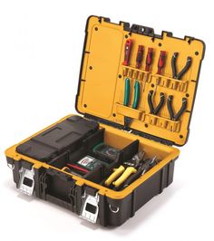 an open tool box filled with tools on top of a white surface and two black cases