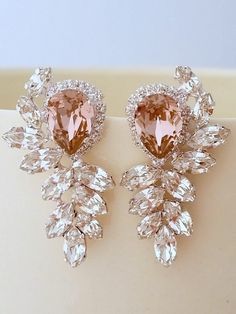 Blush pink and clear diamond chandelier earrings | blush silver earrings | Gatsby style stud earrings | blush wedding | crystal cluster earrings by EldorTinaJewelry | http://etsy.me/1L5LeiZ Wedding Pink Sparkling Crystal Earrings, Pink Sparkling Crystal Earrings For Wedding, Dazzling Pink Earrings For Wedding, Pink Chandelier Earrings, Crystal Cluster Earrings, Morganite Earrings, Diamond Chandelier Earrings, Diamond Chandelier, Large Stud Earrings