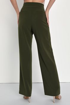 Have all the confidence you need with the Lulus A Power Mood Olive Green High-Waisted Wide Leg Trouser Pants! Lightweight crepe woven fabric shapes a boss-babe, high banded waist with a hidden zip fly and a covered button closure. Wide pant legs fall to ankle-grazing hems and feature decorative welt pockets at the back. Fit: This garment fits true to size. Length: Floor length. Size medium Inseam: 30.75 Front Rise: 12.00 Waist: Fitted - very fitted at natural waist. Hip: Fitted - consider sizing Wide-leg Dress Pants With Elastic Waistband, Wide-leg Elastane Dress Pants With Elastic Waistband, Green Bottoms With Elastic Waistband For Work, Green Elastic Waistband Bottoms For Workwear, Green Long Pants For Office, Tailored Wide-leg Green Pants, Green Tailored Wide Leg Bottoms, Tailored Wide Leg Green Bottoms, Elegant Green Wide Leg Pants With Elastic Waistband