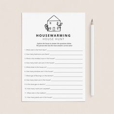 a house warming question card with a pencil next to it