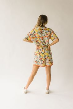 The Reynolds Drawstring Shorts has a flexible waistline with a fun + colorful floral print. These shorts have hidden side pockets + a relaxed fit. They are a versatile + comfortable everyday option. Pair with The Lively Button Up Blouse to make it a set. Details Model is wearing a small self/lining: 100% polyester Fabric Care Guide Here Sizing & Fit Measurements are approximate and taken while laying flat across the front. Not doubled. x-small: waist = 12"; length = 15" small: waist = 13"; lengt Piper And Scoot, Tank Jumpsuit, Free Throw, Textured Dress, Detailed Sweater, Burgundy Floral, Cargo Joggers, Button Up Blouse, Drawstring Shorts