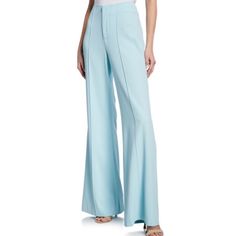 Nwt!! Light Blue Dylan High-Waist Wide-Leg Pants By Alice + Olivia. These Pants Have Never Been Worn And Still Has Tag Attached. Perfect Condition! The Alice + Olivia "Dylan" Pants Feature A Wide-Leg Silhouette For A Fluid And Lightweight Feel. Fitted With A High Waist And Sewn Pleats To The Legs, They Offer An Elegant Approach With Contemporary Style. Back Besom Pockets, Raised Seams, Hook/Zip Fly Closure. Polyester Shell/Lining. Measurements: Size - 2 11.4" Rise; 15.8" Back Rise; 35" Inseam. Formal High-rise Pants For Spring, Formal High-rise Spring Pants, Formal High Rise Pants For Spring, Elegant High-rise Wide Leg Pants For Workwear, Chic Full Length Summer Pantsuit, Chic Full-length Summer Pantsuit, Chic Summer Full Length Pantsuit, Chic Blue Pantsuit With Trousers, Spring Blue Wide Leg Pantsuit