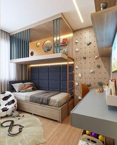 a bedroom with a bunk bed next to a desk