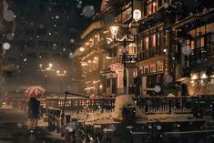 a woman with an umbrella walks down a snowy street at night