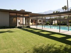 a house with a swimming pool in the yard