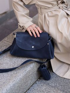 I will add a full description very soon, I am working with it now ... Size S Top Length 7.9in / 20cm Bottom Length 10.2in / 26cm Bottom width 1.4in / 11cm Height 6.3in / 16cm Size M Top Length Bottom Length Bottom width Height Navy Leather Shoulder Bag For Everyday, Navy Leather Shoulder Bag For On-the-go, Navy Crossbody Satchel For Everyday Use, Navy Leather Shoulder Bag For Daily Use, Navy Crossbody Shoulder Bag For Everyday Use, Work Travel Bag, Handmade Leather Bag, Leather Crossbody Bags, Small Crossbody Purse