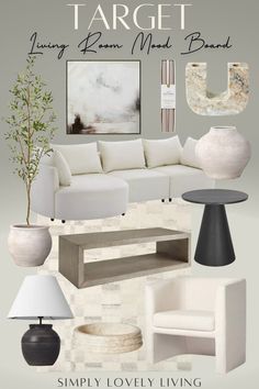 a living room with white furniture and accessories in it's color scheme, including the coffee table