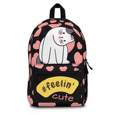 A black backpack with kitty cat and slogan #feeling cute.  Have you got room for all that? With our roomy and durable backpack, you will! This bag is made from spun polyester and weights 1.3 lbs, just enough to be light, strong and long-lasting. Grab it, stow it, throw it onto the seat next to you, this backpack can take it, and so will you, wherever you go! .: 100% polyester .: Lightweight and waterproof .: Adjustable shoulder straps .: Custom name tag sewn inside .: Note: Size variance +/- 0.5 Kawaii Backpack With Cat Design For Students, Kawaii Cat Design Backpack For Students, Cute Student Backpack With Cat Design, Cute Backpack With Cat Design For Back To School, Cute Cat Design Backpack For Travel, Cute Cat Design Backpack, Cat Design Backpack For Back To School, Trendy Cat Design Backpack For Daily Use, Trendy School Backpack With Cat Design