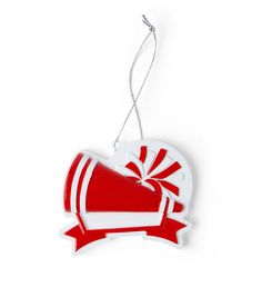 a red and white heart shaped ornament with a bow on the top, hanging from a string