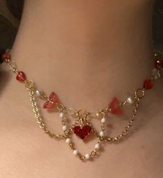 Swiftie Red choker (adjustable) $35.00 Now available 💋 #red #redtaylorsversion #redtv #heart #heartshaped #taylorswift #swiftie #erastour #gemstones #gemstonejewelry #literature #dragons #dragon #greekmythology #beadsjewelry #cottagecore #fairycore #smallbusiness #smallbusinessowner #smallbusinesssupport #flowers #flower #flowerjewellery Coquette Jewelry, Homemade Necklaces, Red Choker, Fairy Jewelry, Beaded Necklace Diy, Diy Bracelet Designs, Easy Diy Jewelry, Fantasy Jewelry