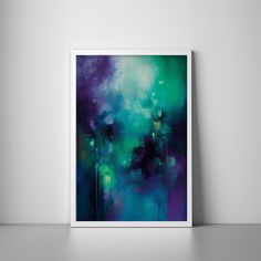 an abstract painting in purple and green on a wall