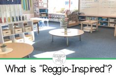 the inside of a classroom with tables and chairs