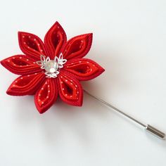 A flower is made in the technique of tsumami kanzashi. Flower is made from grosgrain and satin ribbons . crystal. Flower's d ~ 2 inches (5 cm). More lapels see here: https://www.etsy.com/shop/JuLVa?section_id=11777522&ref=shopsection_leftnav_4 At your request can be made a fower of a different color combinations. My handworks can be a unique gift for you, your family and friends! For more items, please visit my shop home: http://www.etsy.com/shop/JuLVa Please be aware that orders are sent vi Red Flower Lapel Pin For Wedding, Red Handmade Flower Brooches, Handmade Red Flower Brooches, Red Flower-shaped Brooch With Handmade Flowers, Red Handmade Flower Brooches For Wedding, Wedding Brooches, Flower Boutonniere, Flower Lapel, Fabric Flower Brooch