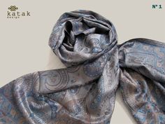 Woven pure silk scarf with classic paisley pattern. Elegant silk stole to wear to a wedding or engagement. Very flattering with any garment. + Size: 70 cm x 180 cm Fabric: 100% pure silk Hand wash + Note that the colors of the original product may vary slightly from those you see on the computer screen. For any questions you may have contact with me. Thank you very much for visiting the store KatakDesign. + -to see more items https://www.etsy.com/es/shop/katakdesign?ref=pr_shop_more + -please re Formal Silk Scarf With Paisley Print, Formal Paisley Print Silk Scarf, Elegant Jamawar Dupatta For Formal Occasions, Elegant Jamawar Shawl, Elegant Silver Dupatta For Formal Occasions, Elegant Silver Formal Dupatta, Classic Silk Scarf For Weddings, Classic Silk Scarf For Wedding, Elegant Pashmina Silk Scarf With Paisley Print