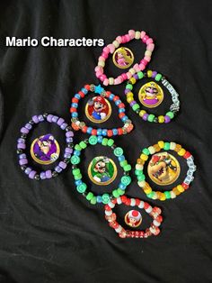 Kandi style bracelets for different mario characters Novelty Plastic Friendship Bracelets, Customized Multicolor Themed Jewelry, Customizable Themed Jewelry Bracelet, Kandi Friendship Bracelets, Mario Bracelet, Mario Kandi, Matching Kandi Bracelets, Scene Bracelet, Pokemon Bracelet