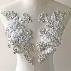 This beautiful floral applique patch basis on tulle fabric,sparkling beaded crystal embroidery details, it is nice pieces sewing onto any craft projects To apply appliques carefully using applique scissors to cut the edges (if needed ).Use applique pins to hold in place.Fix the applique on the dress using glue or needle to sew the applique on the dress or garment the flower patch can arranged by your own . the beautiful applique flowers can be made in nice neckline collar , bridal veil. any sort Embroidery Patterns Wedding, Bodice Applique, Wedding Dress Evening, Wedding Dress Prices, Crystal Embroidery, Prom Accessories, Floral Patches, For Wedding Dress, Applique Wedding Dress