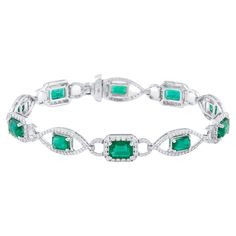 Tresor Diamond Bracelet features 1.96 cts diamond and 6.64 cts emerald in 18k white gold. The Bracelet are an ode to the luxurious yet classic beauty with sparkly diamonds. Their contemporary and modern design makes them versatile in their use. The Bracelet are perfect to be worn daily, at parties, music galas, charity events, conferences, and even weddings. Charity Events, Classic Beauty, Emerald Diamond, Pandora Charm Bracelet, Diamond Bracelet, Jewelry Bracelets, Emerald, Charm Bracelet, White Gold