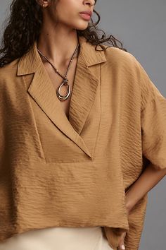 Light and airy, the bestselling Dylon features a chic wide placket and a swingy, boxy fit. | The Dylon Short-Sleeve Wide-Placket Top by Anthropologie in Brown, Women's, Size: Largearge, Polyamide/Viscose Womens Short Sleeved Shirts, Cheap Oversized Blouse For Office, Big Sleeve Shirt Women, Affordable Modern Women's Blouse, Trendy Tops For Women Blouses, Luxury Shirt With Shirttail Hem For Spring, Shop Blouses For Women, Chic Short Sleeve Tops, Winter Blouses For Women 2022