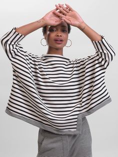 A striking boxy silhouette in top in cream with black stripes with a geometric hem featuring narrower stripe trim, a standing boxy collar, wide sleeves, and dropped shoulders. Boxy Top Outfit, Cocoon Dress, Stripped Tops, Boxy Top, Striped Jersey, Wide Stripes, Cozy Pullover, Jersey Top, Wide Sleeves