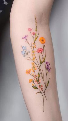 an arm with flowers painted on it