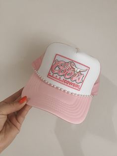 This custom made trucker patch hat is perfect for any occasion whether it be for spring/summer time, a lake hat, a gift for someone, or just a cute accessory to add a little spice to your outfit 🧢✨ DETAILS-  * This hat is one size with an adjustable SnapBack that is adjustable from 20in. - 23.5in. * The color of this hat is Light Pink & White but is available in many colors. * The material of the hat is polyester with iron on patches  NOTICE OF NON-AFFILIATION AND DISCLAIMER: We are not affiliated, associated, authorized, endorsed by, or in any way officially connected with the brand shown or any of its subsidiaries or its affiliates. All related names, marks, emblems and images are registered trademarks of their respective owners. These are not official merchandise. REFUNDS AND CANCELLAT Cheap Pink Trucker Hat For Gift, Cheap Pink Trucker Hat For Summer, Diy Trucker Hat Ideas, Trucker Hats With Patches, Style Improvement, Trucker Hat Women, Hat With Patches, Iron Patches, Camo Trucker Hat