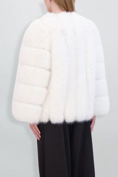 Bold, cozy, and modern. Luxury Long Sleeve Blazer For Winter, Luxury Winter White Long Sleeve Fur Coat, Luxury Long Sleeve Winter White Outerwear, Luxury Winter White Fur Coat For Winter, Luxury Winter White Outerwear With Faux Fur Trim, Luxury Winter White Fur Coat, Luxury Long Sleeve Winter Fur Coat, Luxury Long Sleeve Fur Coat For Winter, Modern Long Sleeve Winter Outerwear