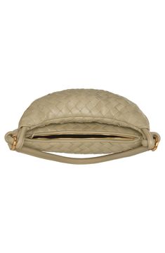 With this soft leather shoulder bag, crafted in the house's iconic intrecciato weave, a removable exterior pouch captures all the things you want close at hand. Top zip closure Shoulder strap Removable exterior zip pouch; interior zip pocket Lined Leather Made in Italy Designer Handbags Zip Pouch, The Things, Bottega Veneta, Leather Shoulder Bag, Designer Handbags, Soft Leather, Shoulder Strap, Weaving, Pouch