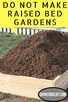 a pile of dirt sitting in the middle of a yard with a sign above it that says do not make raised bed gardens