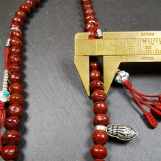 ❤This bodhi beads mala is made by Tibetan craftsmen and come from Hepo Town, Baiyu County, the birthplace of the famous Tibetan handicrafts,about 30 years old, hold and blessed by a lama in Baiyu Monastery.It is composed of 108 bodhi seed beads, and is equipped with 3 agate beads, silver bead counters are installed on both sides, 1 mani jewel bead clip,and finally consists a bone guru bead and vajra on the end, very elegant.❤Details1. Handmade 108 bodhi beads approximately 8mm,mala's perimeter i Bohemian 108 Beads Mala For Blessing, Bohemian Mala With 108 Beads For Blessing, Hand-strung Spiritual Beads For Blessing, Bohemian Mala With 8mm Beads For Blessing, Spiritual Mala With 108 Beads For Blessing, Traditional Handmade Mala For Meditation, Traditional Mala With Gemstone Beads For Healing, Artisan 108 Beads For Meditation, Adjustable Artisan Mala For Rituals