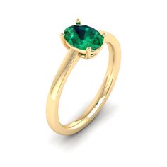 This elegant ring features a stunning oval emerald stone set in lustrous white gold. The vibrant green hue of the emerald is beautifully complemented by the brilliance of the white gold band, creating a timeless and sophisticated piece of jewelry. Metal: 14K Gold Setting Type: Prong Rhodium Finish: Yes, on White Gold Gemstone Details: Gemstone: Emerald Shape: Oval Average Dimensions: 8.00 x 6.00 MM Quantity: 01 Average Cut: Very Good Average Color: Medium to Dark Green Average Clarity: Eye Clean Elegant Oval Emerald Ring For May Birthstone, Green Oval Cabochon Emerald Ring For Wedding, Green Emerald Oval Cabochon Ring For Wedding, Oval Green Emerald Ring For May Birthstone, Oval Green Emerald Rings, Green Oval Rings For Promise, Oval Green Birthstone Ring, Green Oval Birthstone Ring, Oval Emerald Promise Ring