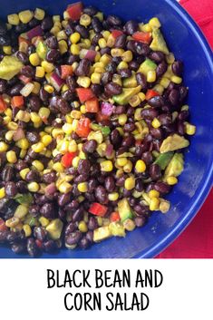 black bean and corn salad in a blue bowl on a red cloth with the words, black bean and corn salad