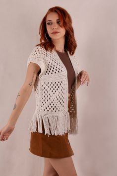 This crochet vest is the perfect clothes for festival goer, beach wear and summer days. If you want to be unique in your boho chic style, then choose this top. Material: 100% Cotton. COLOR: Here shown in Ecru (No4). You can choose any of the colors shown in samples. (Please note that light effect, monitor's brightness, contrast etc. may cause a slight color difference) SIZE: The measurement table is at the end of the photos. If you have any questions about what size to choose please contact me a Lace Vest Outfit, Harry Styles Sweater, Lace Knit Top, Patchwork Vest, Sustainable Knitwear, Lace Vest, Long Knit Cardigan, Rainbow Sweater, Cotton Vest