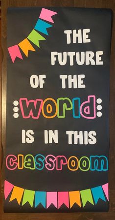 a sign that says the future of the world is in this classroom