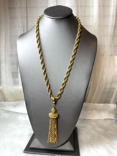 Wonderful vintage Monet necklace with a very nice chain tassel dangling from a filigree ball, it's has a decorative fold over clasp signed Monet with the copyright symbol on the back. The chain measure 24" long and the removable  tassel approximately 4" long including the bail This necklace is circa 1960's and is superior workmanship indicative of Monet jewelry "Monet the master of jewelers"  Excellent vintage condition. Please contact me with any questions you have  Thank you for stopping by. Copyright Symbol, Book Pieces, Monet Jewelry, Vintage Monet, Rope Chain, Tassel Necklace, Tassels, Vintage Jewelry, 18k Gold