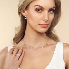 That luxurious yet understated look is easy to achieve with this diamond station necklace in your wardrobe. This beautiful piece features a barely-there chain adorned with five prong-set diamonds in different cuts. The diamonds are positioned evenly along the necklace's base, ready to catch light and deliver a subtle sparkle. Luxury Formal Diamond Cut Station Necklace, Elegant Diamond Cut Station Necklace, Fine Jewelry Diamond Station Necklace With Brilliant Cut, Luxury Diamond Station Necklace With Delicate Chain, Elegant Brilliant Cut Diamond White Station Necklace, Station Necklace, Prong Setting, Diamond Necklace, Lab