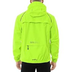 the back view of a man wearing a neon green jacket with hood up and black pants