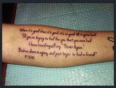 a person's arm with a poem on it that reads, when it's god