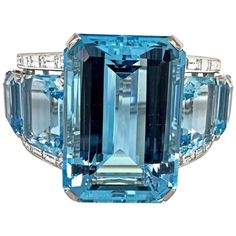 This one of a kind impressive bangle is set in platinum. The center features one large emerald cut Aquamarine weighing 181cts and is flanked by four fancy cut Aquamarine's weighing approximately 60cts in total. The, Aquamarine's are accented by approximately 10cts of baguette cut diamonds F/G Color VS clarity. Markings 950 PLAT Diamond Parure, Ring With Ruby, Aquamarine Cocktail Ring, Jewerly Ring, Estate Diamond Jewelry, Vintage Cocktail Ring, Platinum Wedding Rings, Diamond Birthstone, Cuff Bangle Bracelet