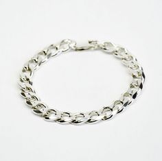 Classic Sterling Silver Chunky Chain Bracelet, Modern Silver Cuban Link Bracelet With Chunky Chain, Silver Cuban Link Jubilee Bracelet For Everyday, Classic Silver Cuban Link Bracelet With Chunky Chain, Minimalist Silver Bracelets With Chunky Chain, Silver Minimalist Bracelet With Chunky Chain, Everyday Silver Curb Chain Bracelets, Silver Cuban Link Bracelet With Chunky Chain, Classic Silver Cuban Link Bracelet For Everyday