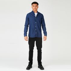 "Introducing our Slim Fit Grandad Collar Denim Shirt in Indigo Blue, the perfect blend of classic style and contemporary finesse. Crafted with utmost care, this denim shirt exudes a timeless charm with its slim fit silhouette that enhances your physique. The grandad collar adds a touch of refinement, while the indigo blue hue brings a sophisticated elegance to your look. Made from high-quality denim fabric, this shirt delivers both comfort and durability. Whether you're heading to a casual gathering or a formal event, our Slim Fit Grandad Collar Denim Shirt in Indigo Blue is the ultimate wardrobe staple for those who appreciate exceptional style and impeccable craftsmanship. Product Features: Indigo blue Denim fabric Slim fit Button front fastening Long sleeve Grandad collar 100% Cotton Ou Classic Indigo Shirt For Work, Classic Slim Fit Denim Shirt, Classic Collared Indigo Shirt, Classic Indigo Collared Shirt, Slim Fit Denim Blue Cotton Top, Denim Blue Slim Fit Cotton Top, Classic Collared Dark Wash Shirt, Denim Blue Slim Fit Long Sleeve Shirt, Casual Navy Button-up Dress Shirt