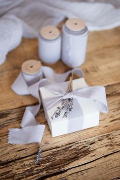 three rolls of twine are tied up on the table