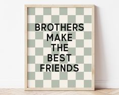 a framed poster with the words brothers make the best friends