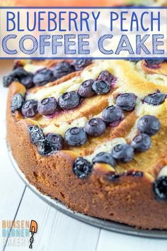 a blueberry peach coffee cake on a plate with the title overlay reading blueberry peach coffee cake