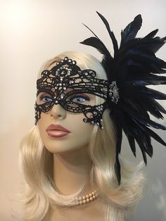 "Black Lace Masquerade Mask with Feathers and Crystals, Women's Lace Mask, Masked Ball, Wedding Masquerade Masks, Bridal Wedding Mask Beware of cheap imitations that use glue! This is an original design by IceGreenEyes. Stiffened and lace mask will not sweat your face like the cheap plastic ones. The mask is also shaped so you have lots of room around the eyes instead of a skinny slice. These masks are hand stitched, not held together with sticky glue that will heat up and fall apart before the Elegant Wedding Masks, Elegant Masquerade Mask For Formal Occasions, Black Masquerade Mask For Wedding Carnival, Wedding Masquerade Mask With Rhinestones, Masquerade Carnival Headpiece, Formal Mardi Gras Masquerade Mask, Elegant Fitted Masquerade Mask For Costume Party, Elegant Fitted Masquerade Mask For Carnival, Elegant Fitted Masquerade Mask For Mardi Gras