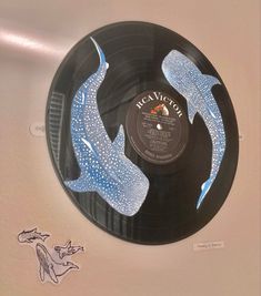 a vinyl record with blue and white designs on it