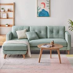 a living room with a blue couch and coffee table